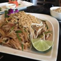 N7. Pad-Thai · Thai style pad thai with browned tofu, bean sprouts, scallions, and crushed peanuts. Spicy.