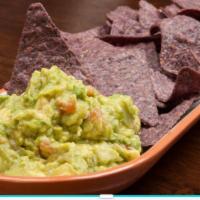 Guacamole and Chips · Vegan. Guac with tortilla chips.