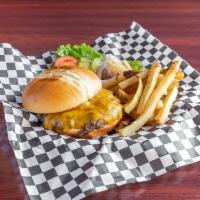Midway Classic Burger · Juicy,​ flame-broiled beef patty on a toasted brioche bun with Midway burger sauce.