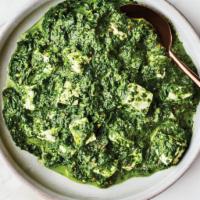 Saag Paneer · Chopped spinach prepared in a delight light cream sauce with cubed paneer.

