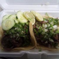 2 Bistek Tacos · Steak. Served on soft corn tortilla with onions and cilantro.