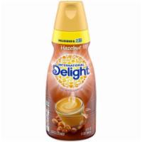 International Delight Creamer Hazelnut Quart · A rich, toasty hazelnut-flavored coffee creamer.