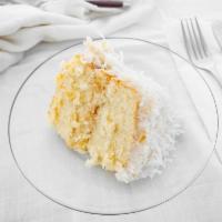 Coconut Pineapple Sour Cream Icing Cake · 