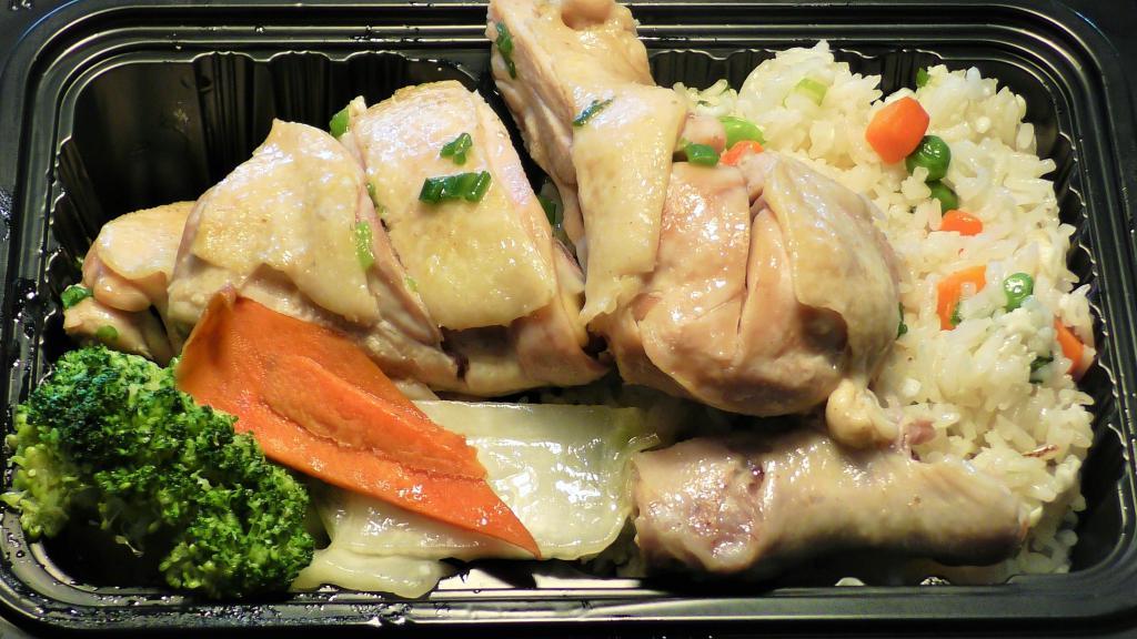 Ginger Chicken Lunch Box · Tender chicken slices basted in savory ginger sauce.  Served with white rice and crispy mixed vegetables.