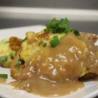 69. House Special Egg Foo Young · With white rice.