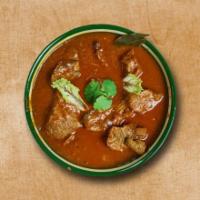 Lamb Legendary · Lamb pieces spiced up with the Indian spices and cooked upon the clay pot.
