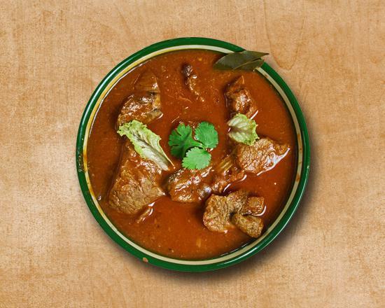 Lamb Legendary · Lamb pieces spiced up with the Indian spices and cooked upon the clay pot.