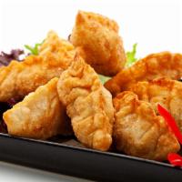 Pan Fried Gyoza Dumplings (煎鸡肉饺子) · Chicken dumplings (7 pcs)