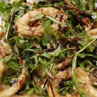 Calamari Balsamico · Calamari frito tossed with hot cherry peppers, baby arugula topped with balsamic reduction.