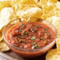 Chips and Salsa · Chips and Salsa.  Our Homemade Artisan Beer Queso can be added.