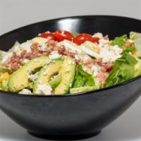 Cobb Salad · Chopped iceberg lettuce and romaine lettuce, sliced egg, applewood smoked bacon crumbles, to...