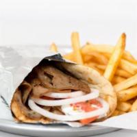 Gyro · Beef and lamb strips or chicken, tomato, onions and tzatziki sauce in grilled pita bread