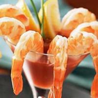 10 Piece Shrimp Cocktail · Shrimp with traditional cocktail sauce and lemon wedges.