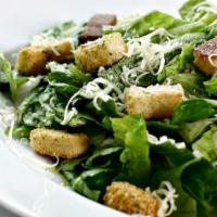 Caesar Salad with Chicken · Bed of crispy romaine lettuce, Parmesan cheese and croutons.