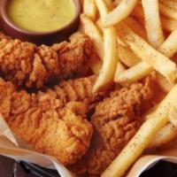 Chicken Tender Basket · Breaded tenders fried golden brown (plain or Buffalo style), served with choice of side, hon...