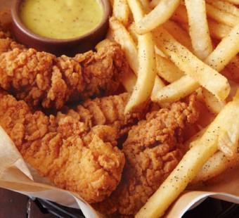 Chicken Tender Basket · Breaded tenders fried golden brown (plain or Buffalo style), served with choice of side, honey mustard and ranch.