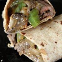 Fabulous Philly Wrap · Shaved tender steak, onion strings, green peppers and lots of melted pepper jack cheese wrap...