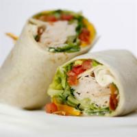 Turkey Bacon Ranch Wrap · Fresh sliced turkey, crispy bacon slices and tomatoes with mixed greens, shredded cheeses an...