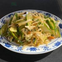 Cucumber Cabbage Salad · Cucumbers, cabbage, peanuts tossed in soy dressing 
