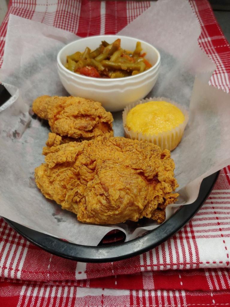 THE MINI CLUTCH · 2 piece chicken dinner with one small feed pan & cornbread (Choose one thigh or breast & one drumstick or wing) 