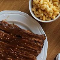 SMALL FOX IN THE HEN HOUSE · Quarter Rack of Pork Ribs with your choice of 1 small feed pan & 1 cornbread see