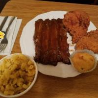 SMALL COOP COMBO · 2 pieces of chicken, a quarter rack of ribs, & choice of 1 small feed pan & cornbread 