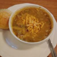 White Chicken Chili Soup · Homemade from white beans, topped with cheddar cheese and served with cornbread.