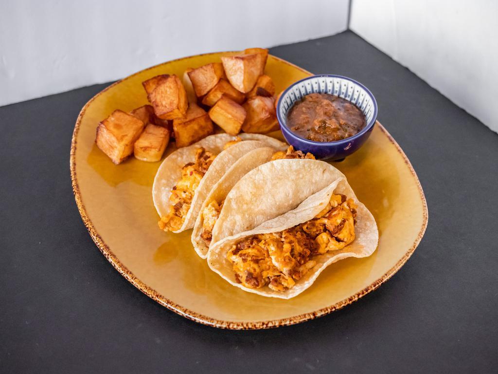 Breakfast Tacos  · Breakfast tacos with your choice of ham, bacon, country sausage, chorizo or sausage link. 3 pieces.