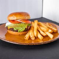 Steel House Burger · A classic. Angus beef patty grilled to perfection, lettuce, tomatoes, mayo and cheddar cheese.