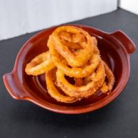 Beer Battered Onion Rings · These circuitous golden brown beauties are an easy treat, starring a pale ale beer batter an...
