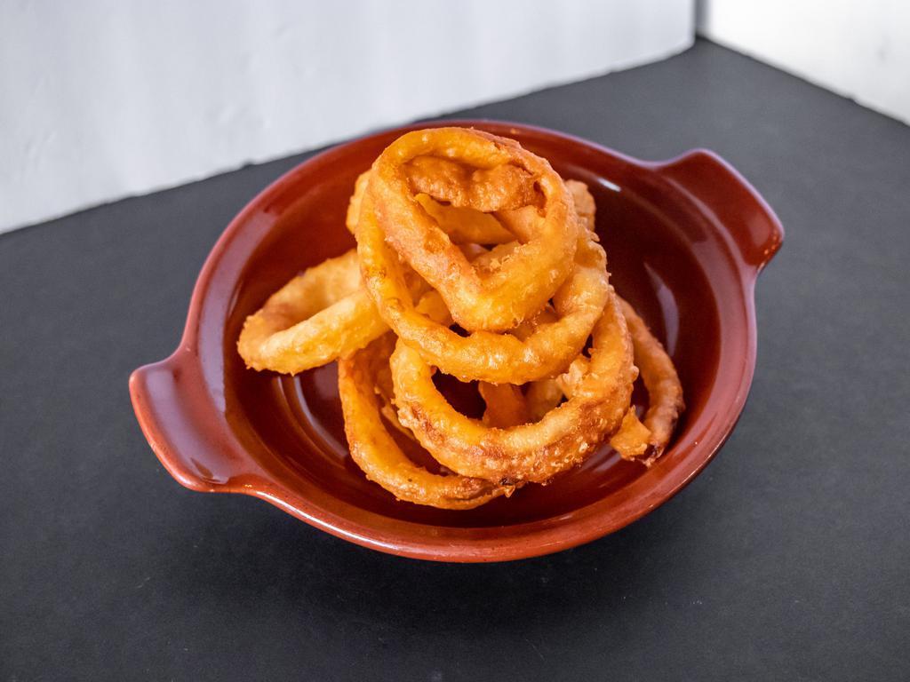 Beer Battered Onion Rings · These circuitous golden brown beauties are an easy treat, starring a pale ale beer batter and thick slices of sweet onion. 