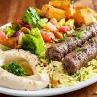 Kabab Plate · Saffron Rice, Romaine Lettuce, Tomato, Onion, Feta cheese, Homemade garlic sauce, Homemade h...