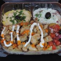 Chicken Plate · Saffron Rice, Romaine Lettuce, Tomato, Onion, Feta cheese, Homemade garlic sauce, Homemade h...