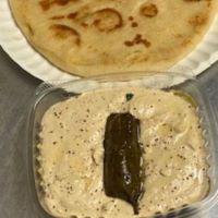 Hummus Plate · Side of hummus with warm pita bread.