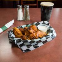 Leprechaun Wings · Cooked wing of a chicken coated in sauce or seasoning.