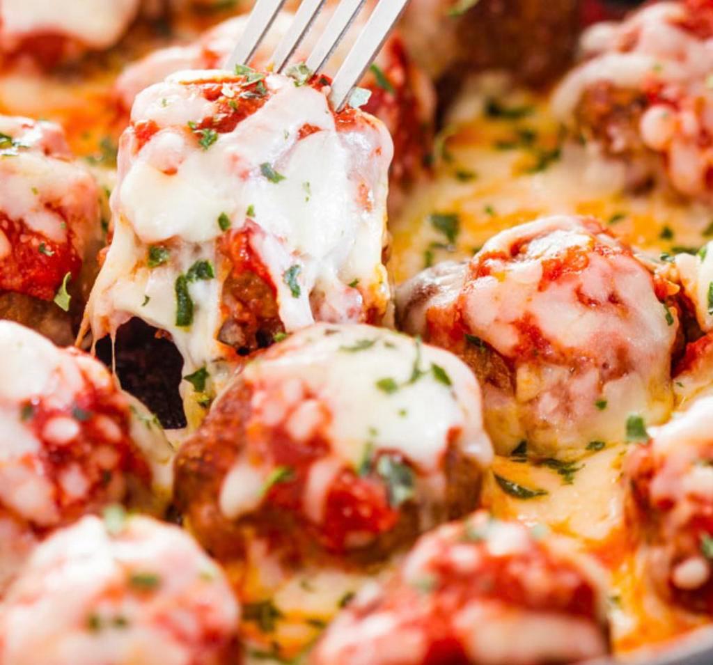 Meatball with Cheese Dinner · 4 pieces served with Italian bread and your choice of spaghetti or ziti.