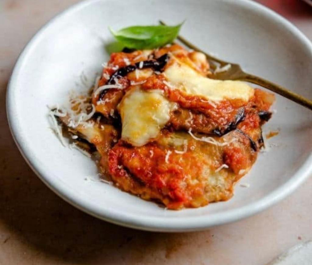 Eggplant with Cheese Dinner · Served with Italian bread and your choice of spaghetti or ziti.