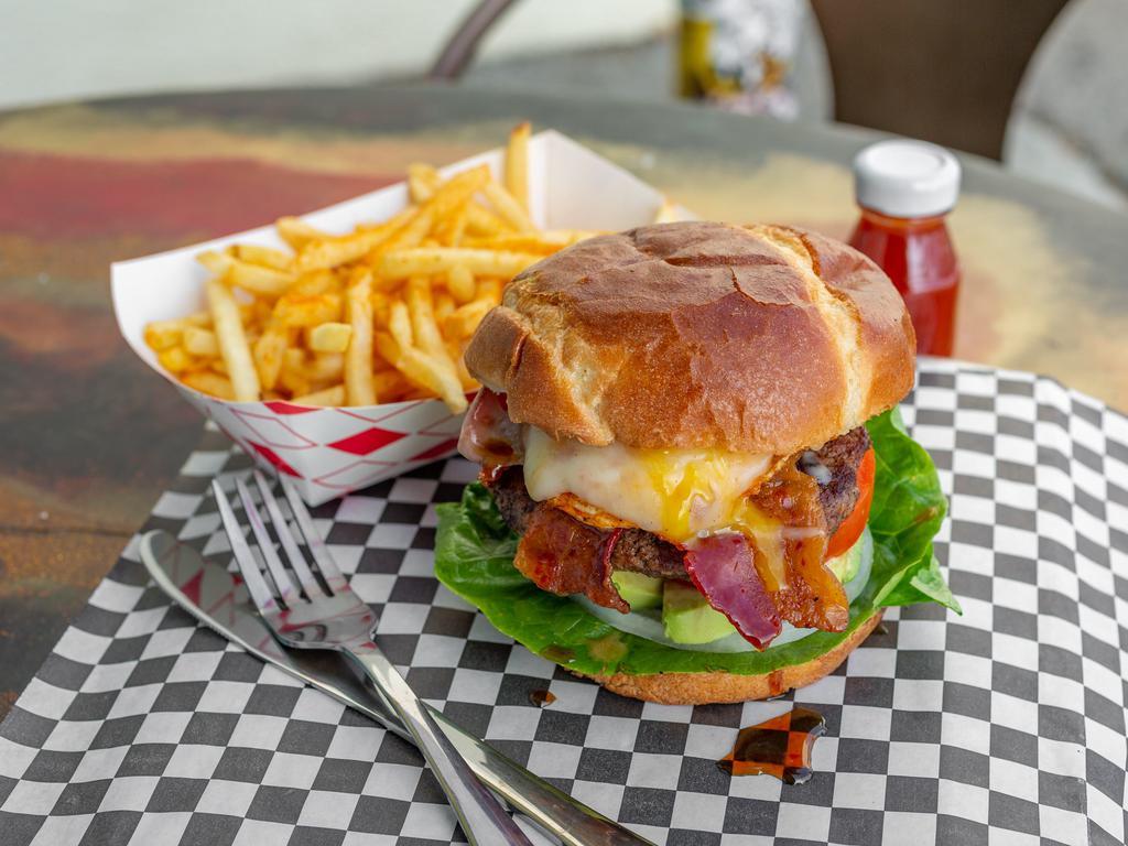 Pocket Burger · Avocado, fried egg, bacon, provolone cheese on a 1/3 lb seasoned fresh ground angus beef patty, our signature pocket sauce, lettuce, tomato, onion and mayo on a buttered brioche bun. Served with seasoned Fries.