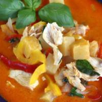 Pineapple Curry · Red curry with coconut milk, pineapples, tomatoes, bell pepper, and basil leaves. 