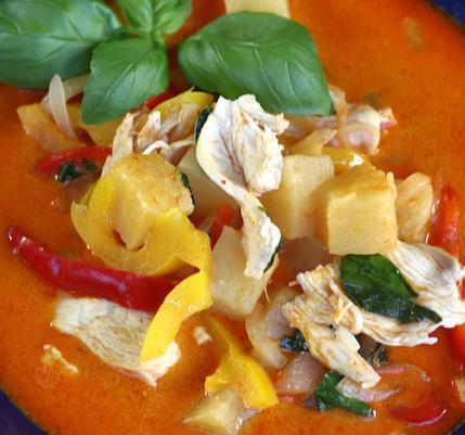 Pineapple Curry · Red curry with coconut milk, pineapples, tomatoes, bell pepper, and basil leaves. 