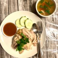 1. Khao Man Gai Tom · Boiled chicken with choice of ginger sauce or plum sauce. Served with jasmine rice and soup.