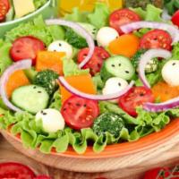 Garden House Salad · Fresh salad made with crispy leaf lettuce, romaine lettuce, cucumbers, carrots, tomatoes and...