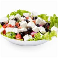 Greek Salad · Fresh salad made with romaine lettuce, feta cheese, stuffed grape leaves, tomatoes, red onio...