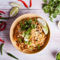 The Chicken Pad Thai · Classic. Thai delicacy of rice noodles with chicken, peanuts, basil, and tamarind.