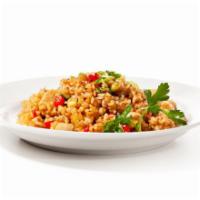 Thai Vegetable Fried Rice · Elegant basmati rice stir fried to perfection mixed with basil bean sprouts, chives, and eggs.