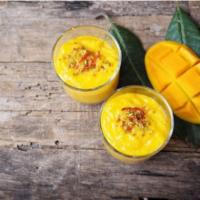 Mango Lassi · Fresh mango pulp blended with yogurt.
