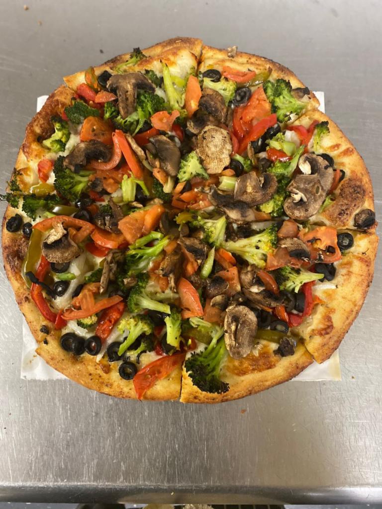 Veggie Delight Pizza · Mozzarella cheese, onions, mushrooms, sweet Peppers, black olives, broccoli and tomatoes. Vegetarian.