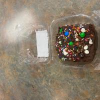 Brownie  · Chocolate brownie with chocolate chips, sprinkles and smothered with chocolate frosting.