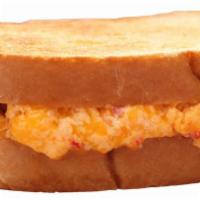 Toasted Pimento Cheese and Bacon · A generous portion of house-made pimento cheese with bacon. Served on sourdough bread.
