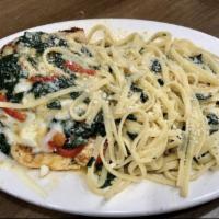 Chicken Florentine Pasta · Sauteed spinach with olive oil, white wine, chopped tomatoes, and mozzarella cheese.